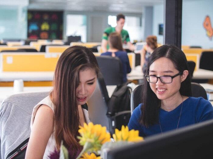 2 women in office working