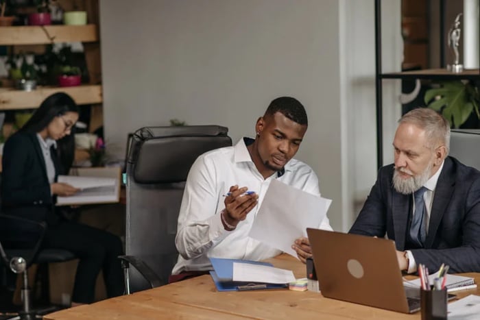 legal team reviewing work in the office