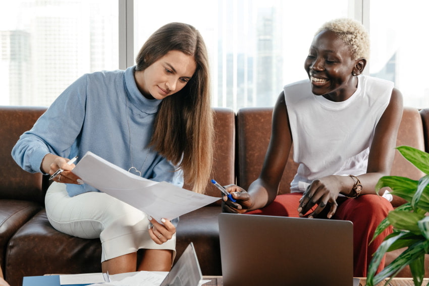 two women reviewing documents