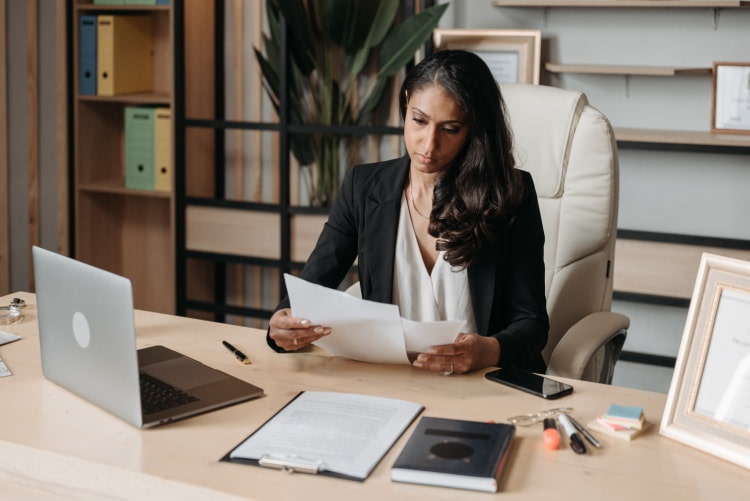 woman reading documents